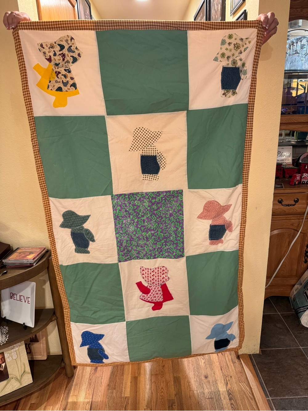 Vintage-Inspired Green and Cream Patchwork Sunbonnet Quilt